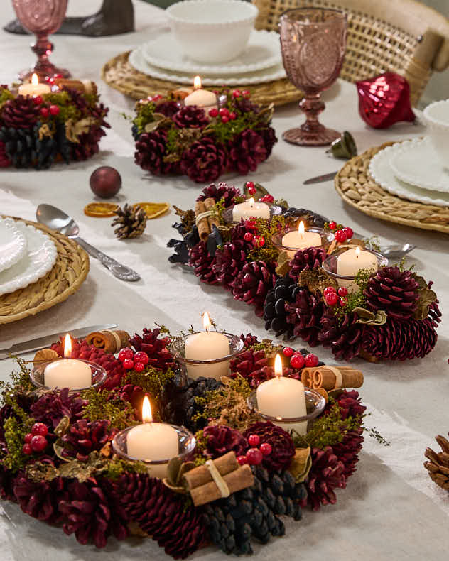 Rustic Dining Table Tea Light Centerpieces with Pinecones and Berries Rustic Dining Table Tea Light Centerpieces with Pinecones and Berries — Christmas Candle Decor