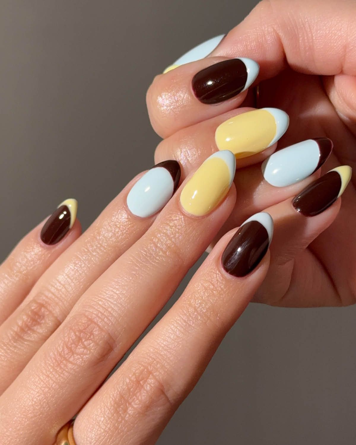 Medium Almond Color-Blocked Yellow Blue Brown French Tips Medium Almond Color-Blocked Yellow Blue Brown French Tips — Yellow Nail Designs