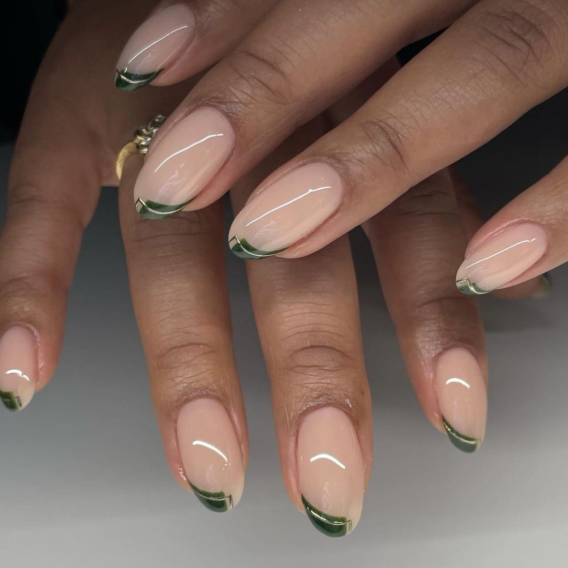 Medium Oval Dark Green Gold Outline French Medium Oval Dark Green Gold Outline French — Trendy Simple Nail Designs