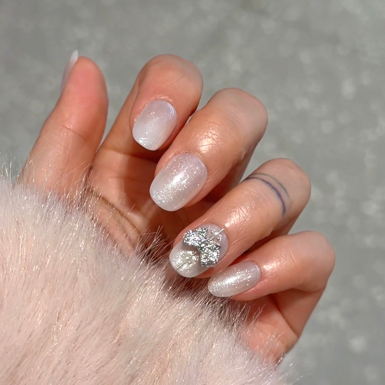Short Oval Pearls with Rhinestone Bow Short Oval Pearls with Rhinestone Bow — Winter Dip Powder Nails