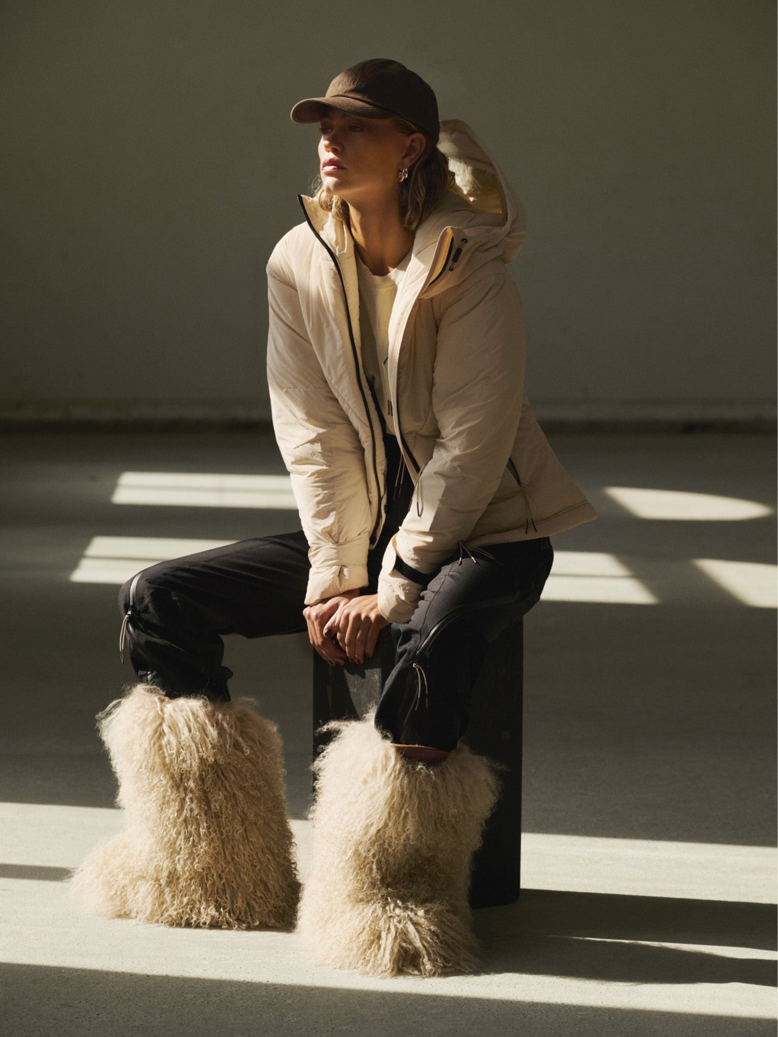 Beige Puffer Jacket with Fluffy White Boots: Bold Winter Statement — Scandinavian Winter Outfits