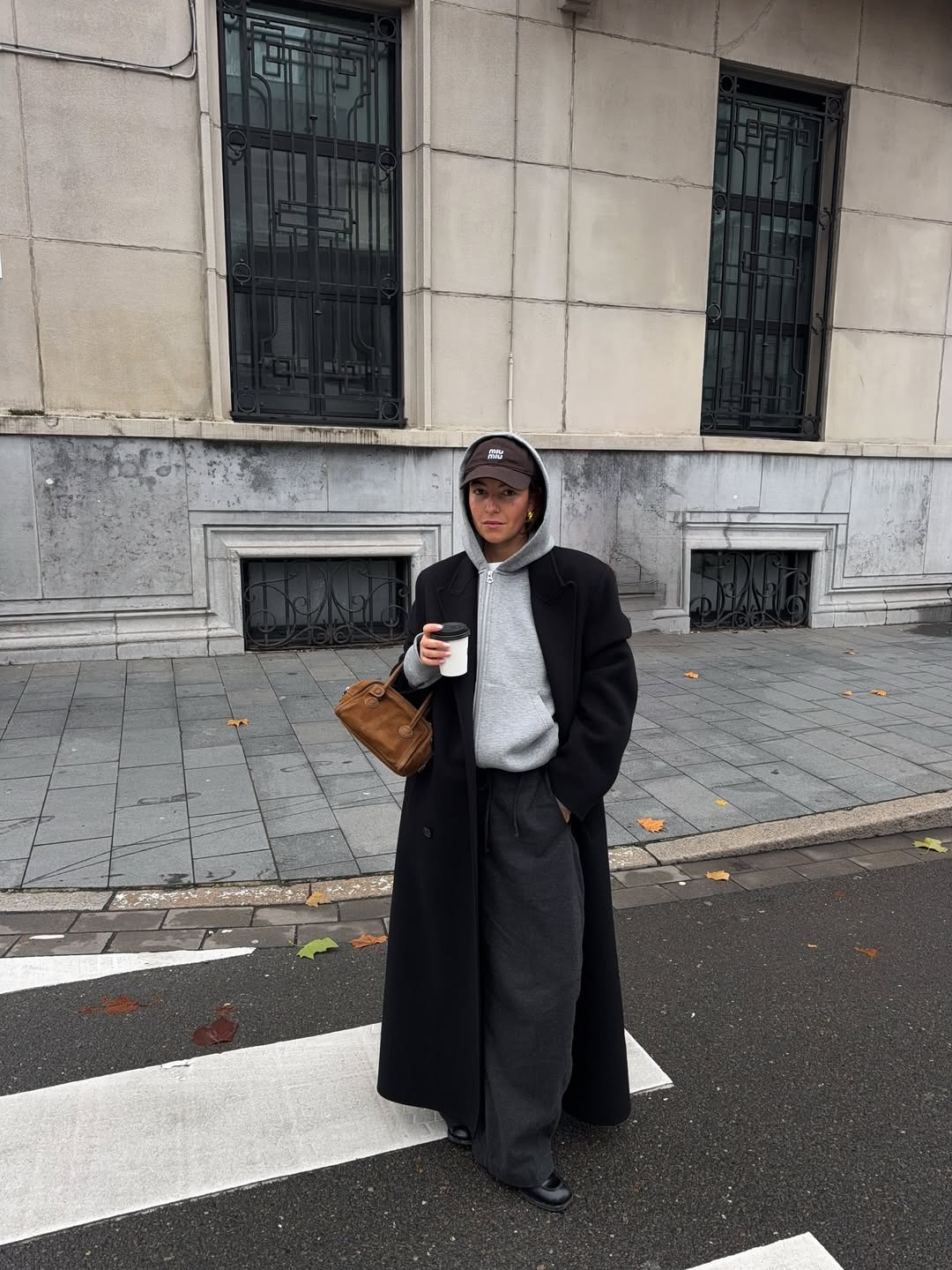 Long Wool Coat Over Hoodie for Casual Chic Travel Long Wool Coat Over Hoodie for Casual Chic Travel — Winter Travel Outfits