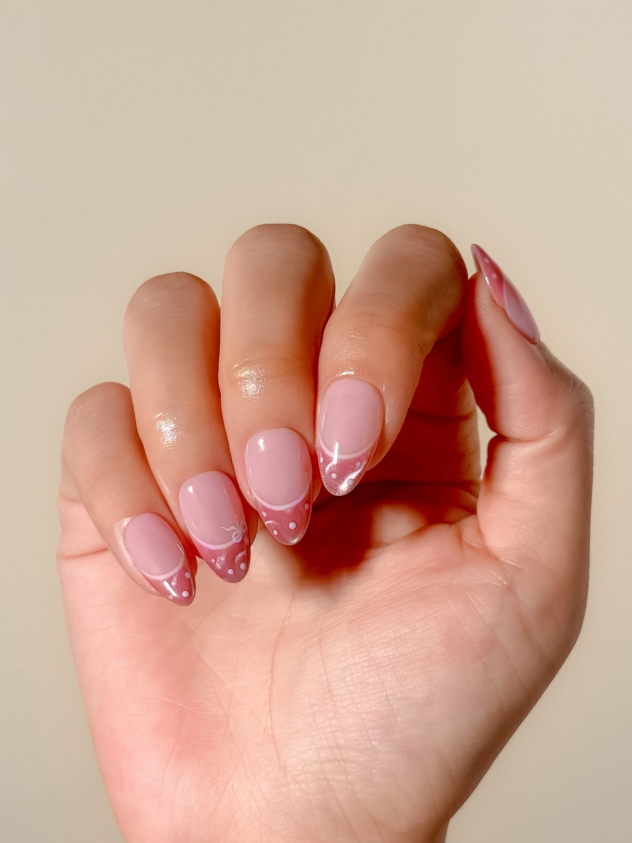 Pale Pink French Tips with Glitter Dots Pale Pink French Tips with Glitter Dots — Trendy Almond Nail Designs