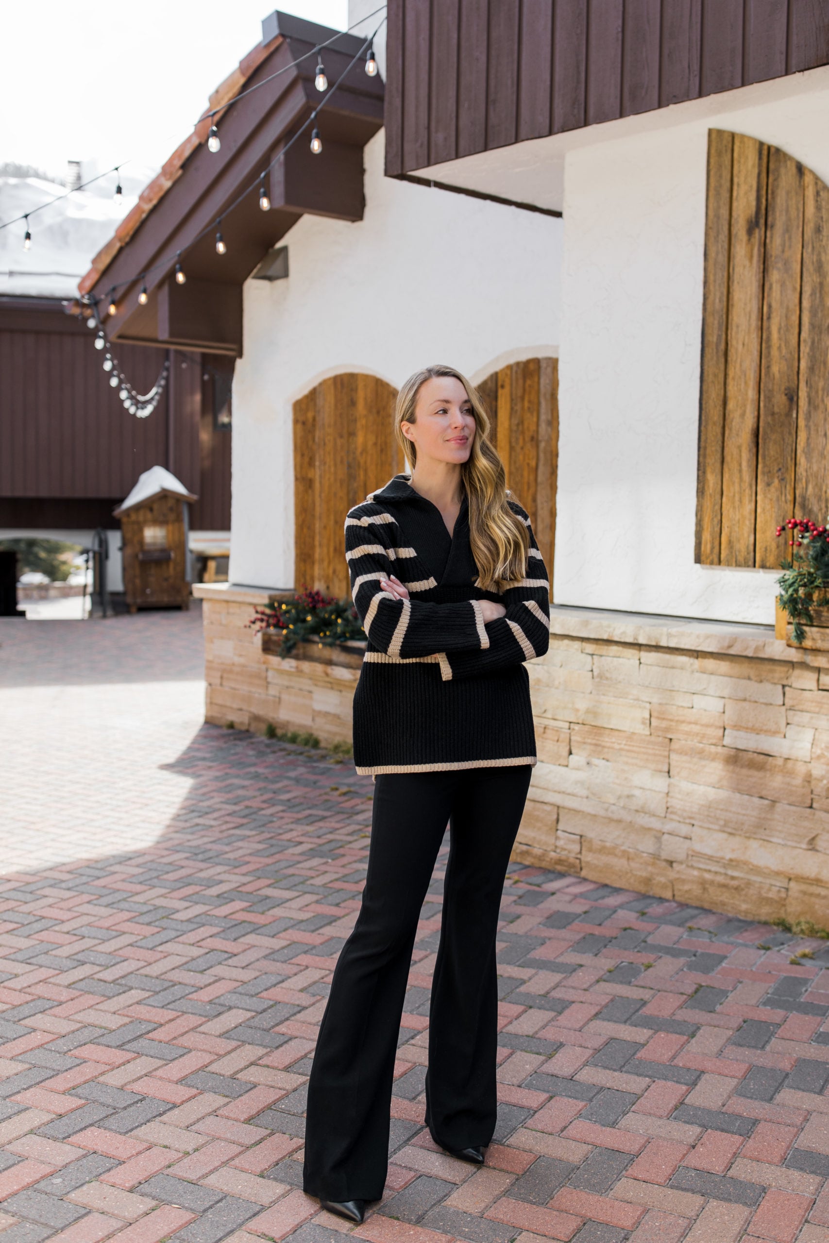 Relaxed Striped Knit Sweater Paired with Wide-Leg Pants — Apres Ski Outfits