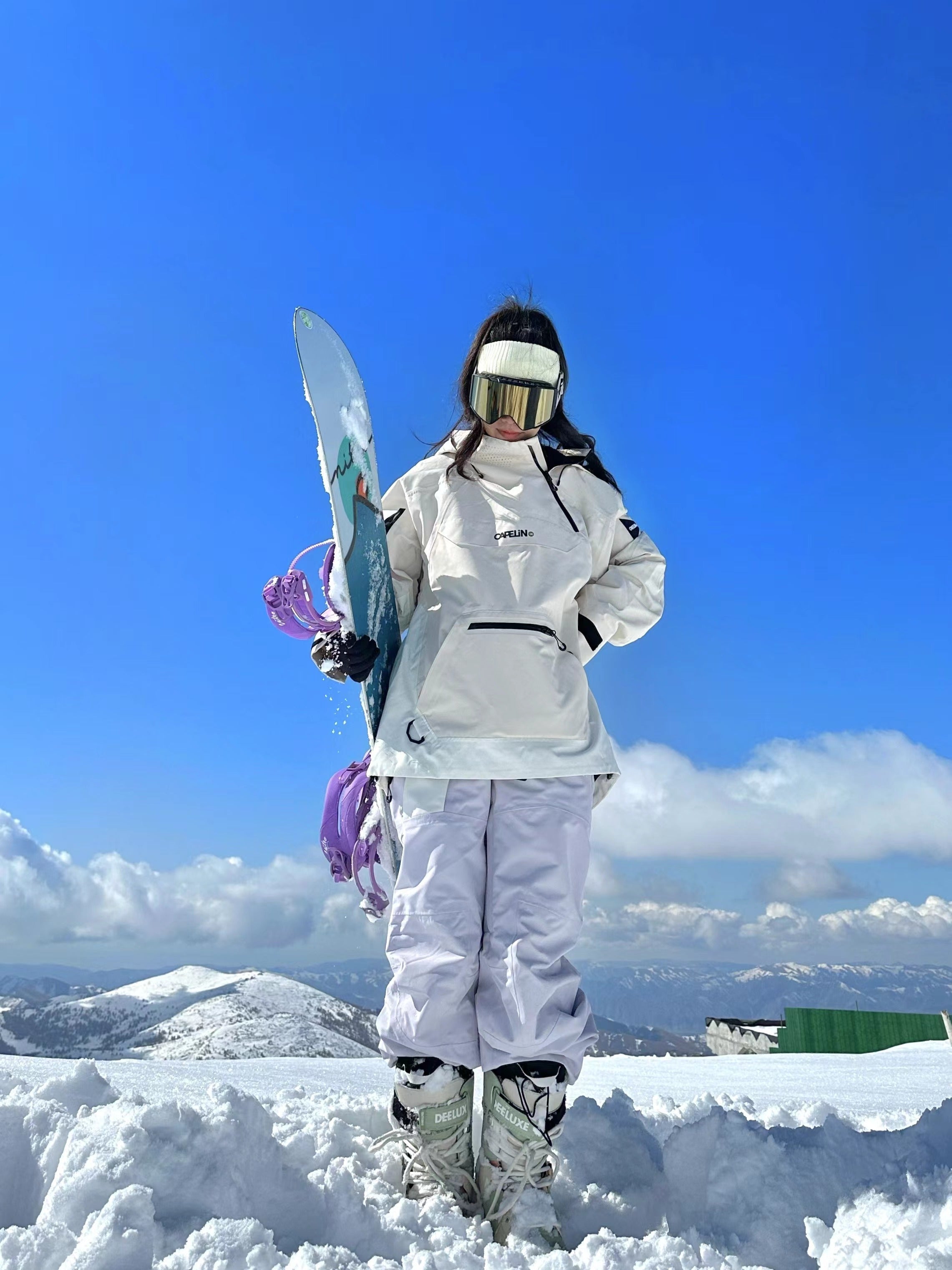 White Snowboard Outfit with Light Purple Pants and Contrasting Stitching White Snowboard Outfit with Light Purple Pants and Contrasting Stitching — Snowboarding Outfits