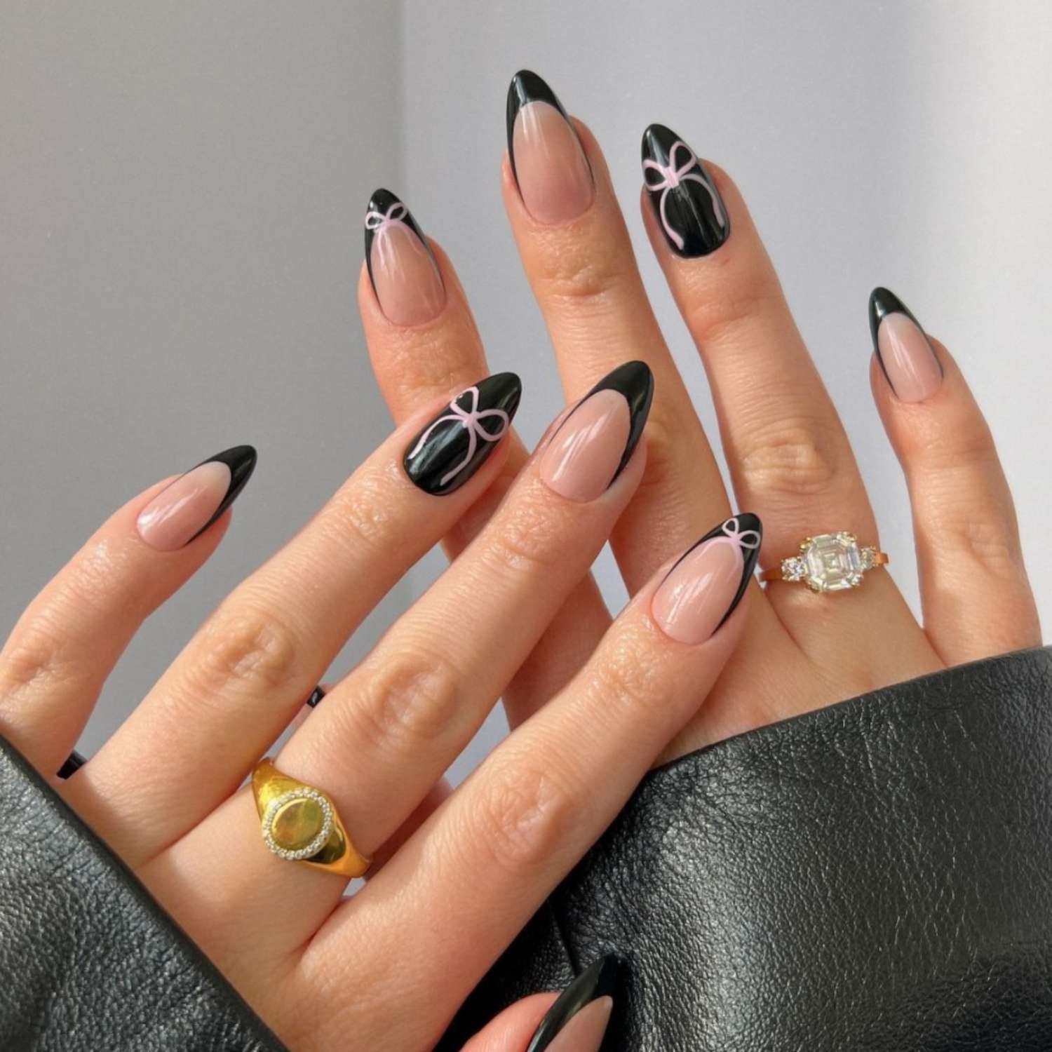 Black French Almonds with Pink Bow Art Black French Almonds with Pink Bow Art — Winter Gel Nails