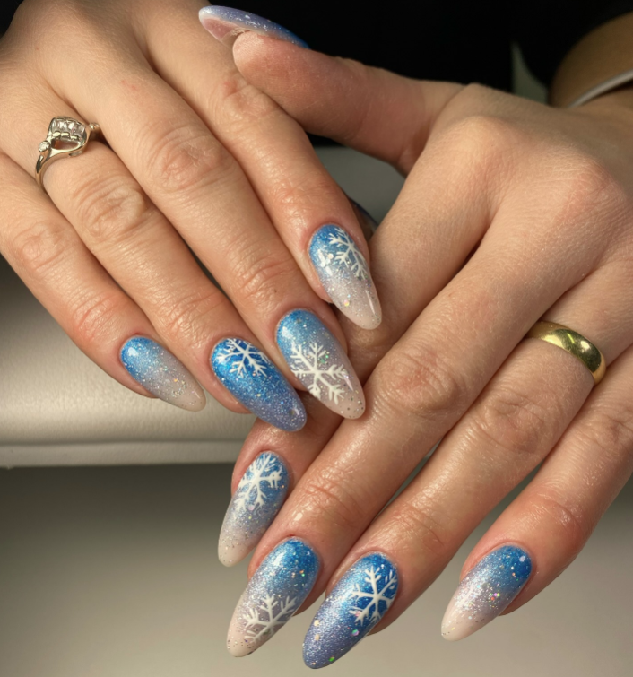 Blue Glitter Ombre Snowflake Almond Nails Blue Glitter Ombre Snowflake Almond Nails — Winter Ombre Nails