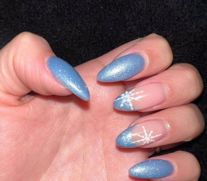 White Snowflake Decals On Accent Nails Light Blue French Shimmer Snowflake Almond Nails White Snowflake Decals On Accent Nails Light Blue French Shimmer Snowflake Almond Nails — Winter Ombre Nails