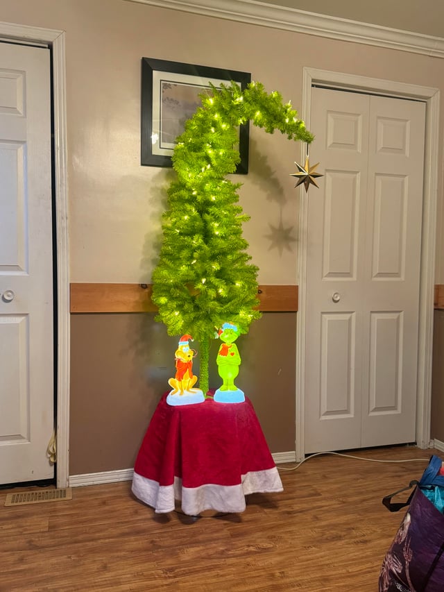 Grinch Christmas Tree on a Red Platform Grinch Christmas Tree on a Red Platform