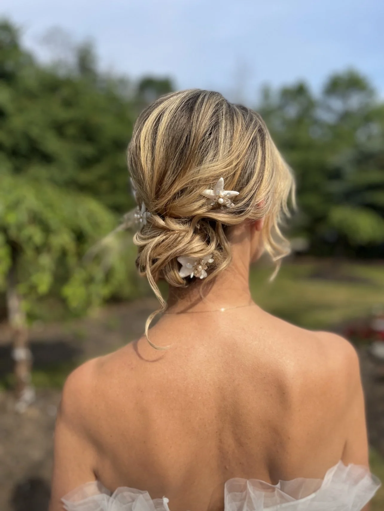 Blonde Twisted Bun With Beach Accessories — Beach Wedding Hair 2027