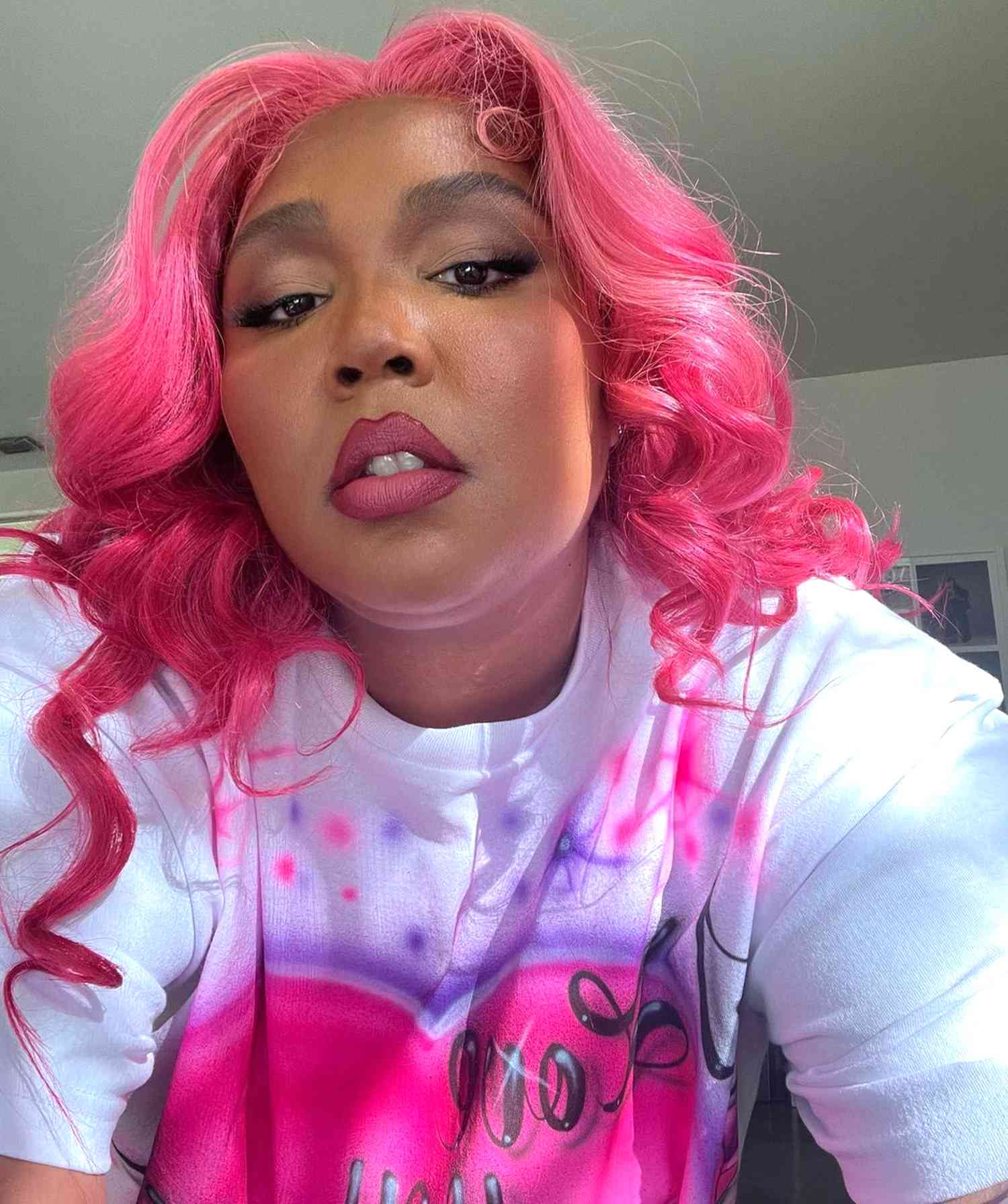 Hot Pink Mid-Back Curls With Wispy Bangs — Pink Hair