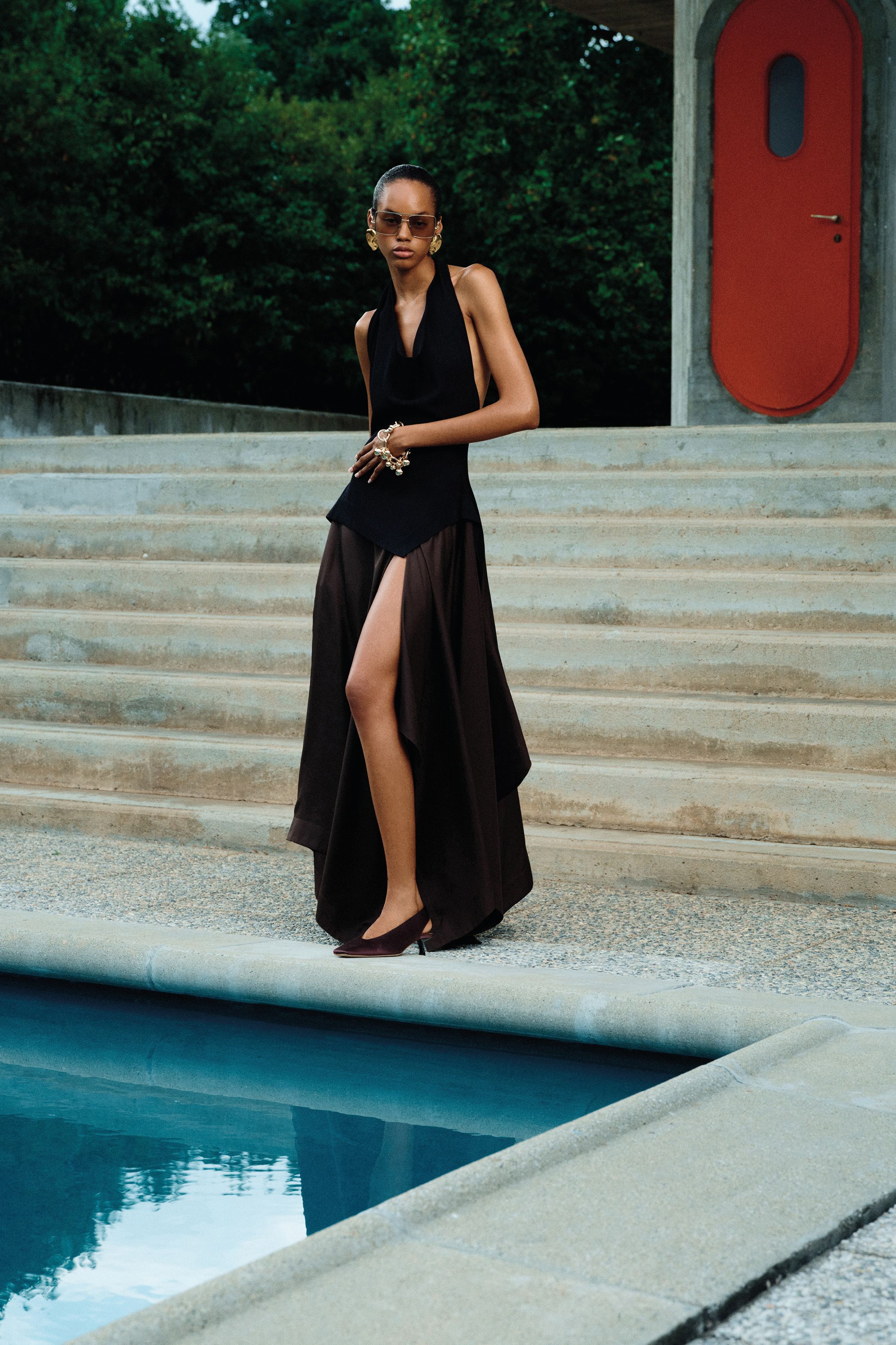 Black Halterneck Top and Flowing Brown Skirt with Slit Black Halterneck Top and Flowing Brown Skirt with Slit — Pool Party Outfits 2027